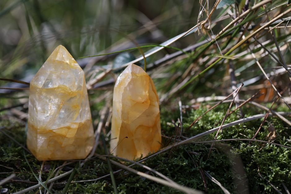 is heat-treated citrine worth buying — two golden citrine crystal towers in natural light