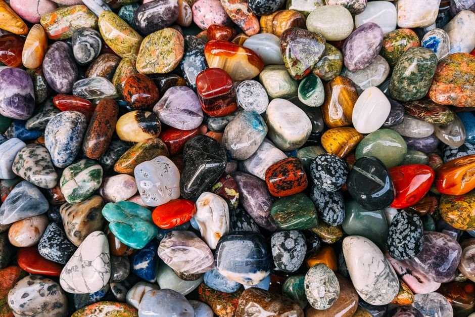 Real vs Fake Gemstone Test — Know What's Actually in Your Collection Assorted polished tumbled stones of every color, the mixed purchases and inherited pieces people most often want to verify