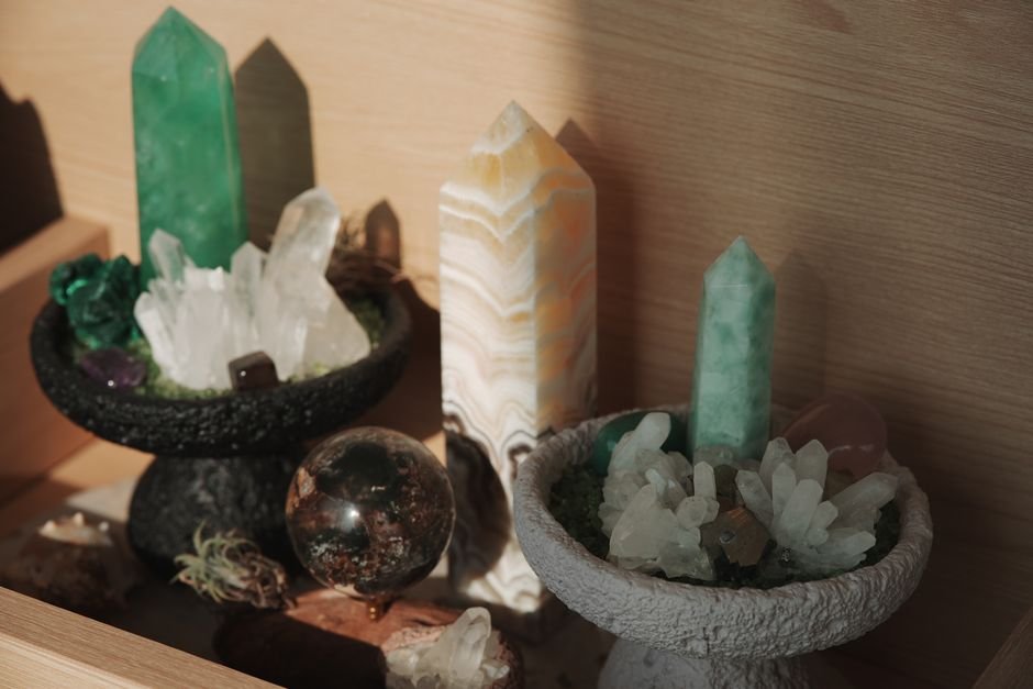 where can i buy genuine crystals — fluorite and calcite towers displayed on a trusted crystal shop shelf