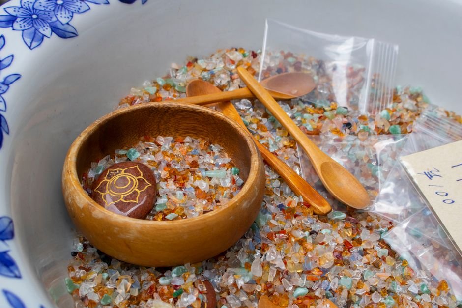 Mohs Hardness and Storage — Why Softer Stones Chip on Contact Mixed gemstone chips piled together in a bowl, the stone-on-stone contact that chips softer minerals over time
