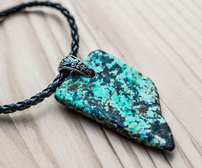 Turquoise pendant, a copper mineral with the same sensitivity to sweat and oils