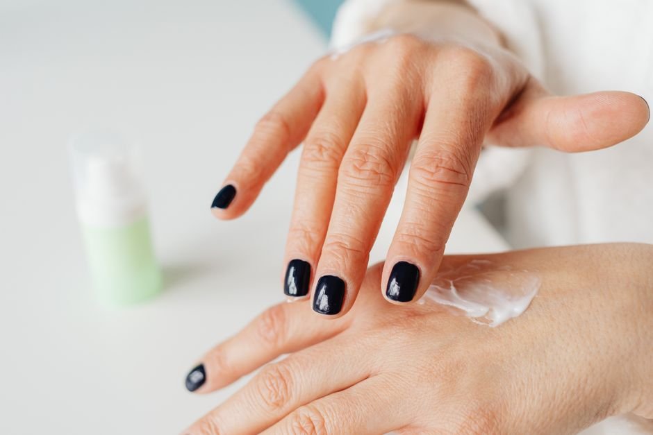 Hand Cream Is Absorbed Straight Into Porous Turquoise Hand cream being applied over the fingers, the daily habit that soaks straight into a porous turquoise ring